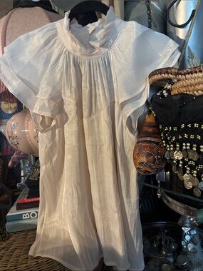 Blu Pepper Sheer Cream Ruffled sleeveless blouse